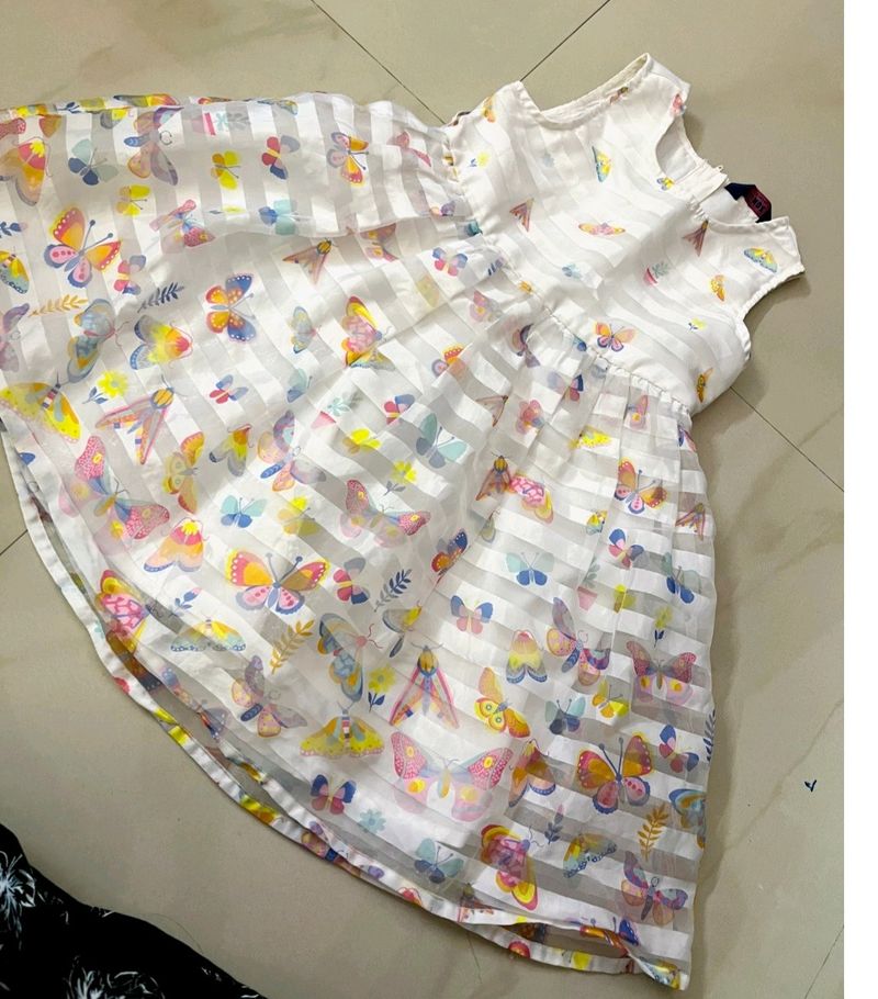 beautiful white col dress with full of butterfly