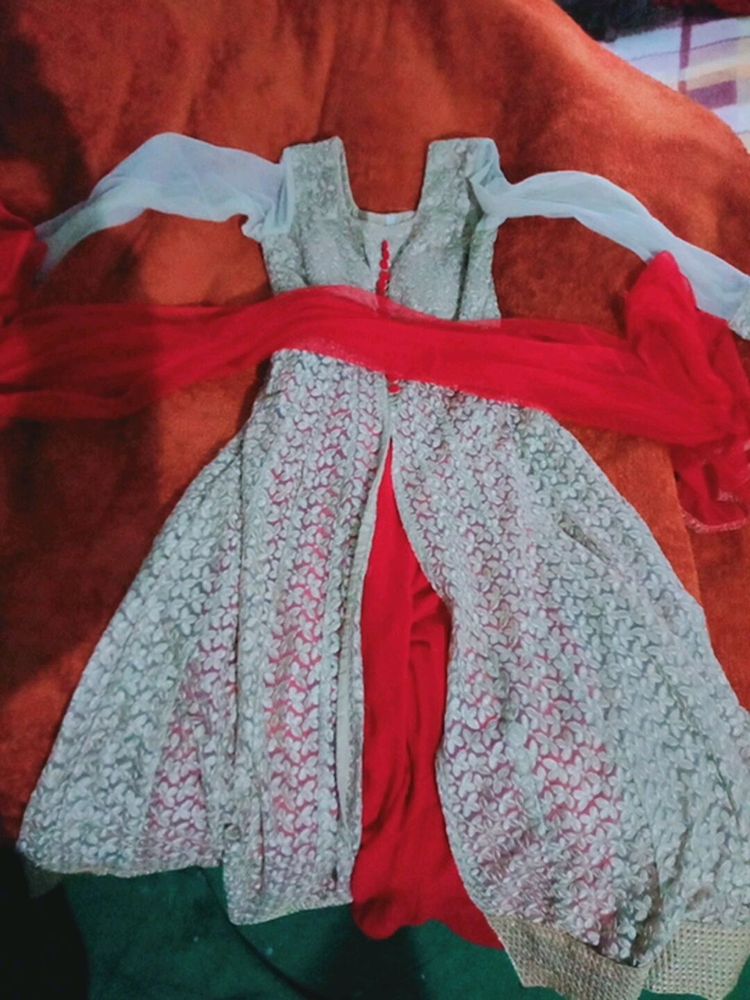 beautiful party wear golden net gown style long kurti with red plazoo and red dupatta