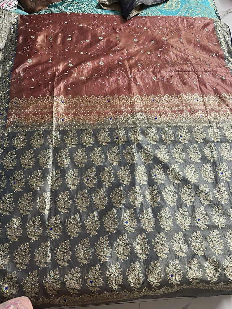 Elegant Bronze Saree with Detailed Border