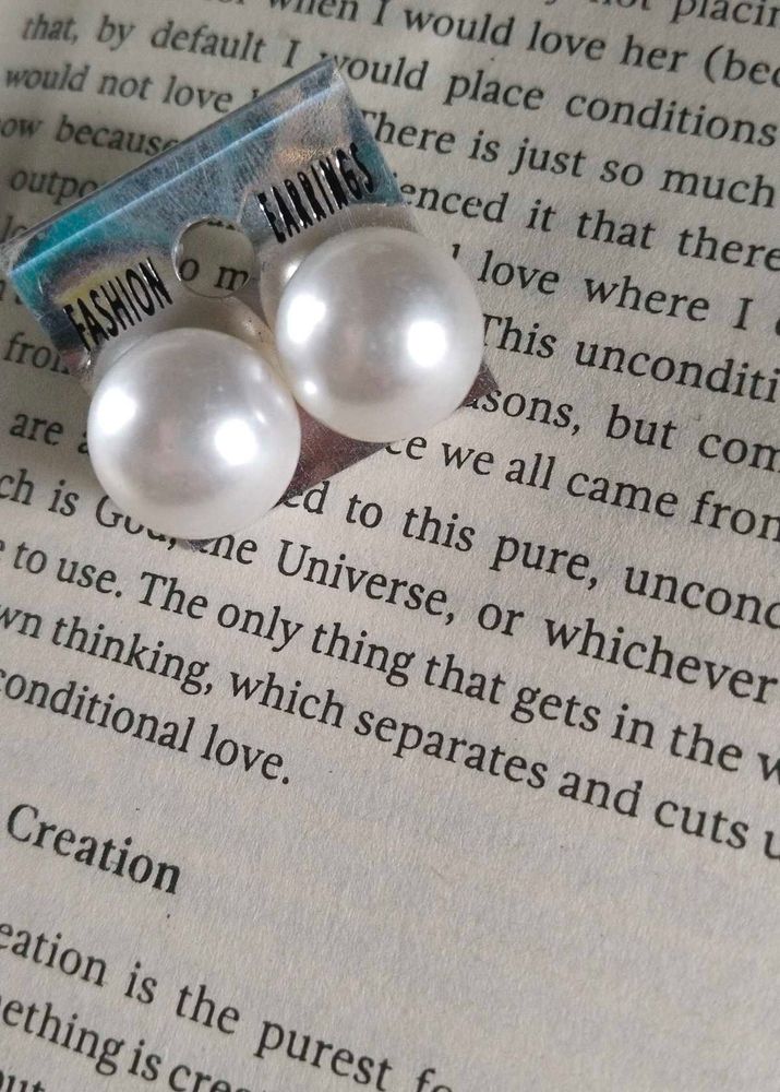 pearl stud earrings.