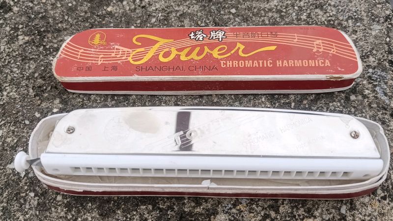 New One hardly used mouth Harmonica