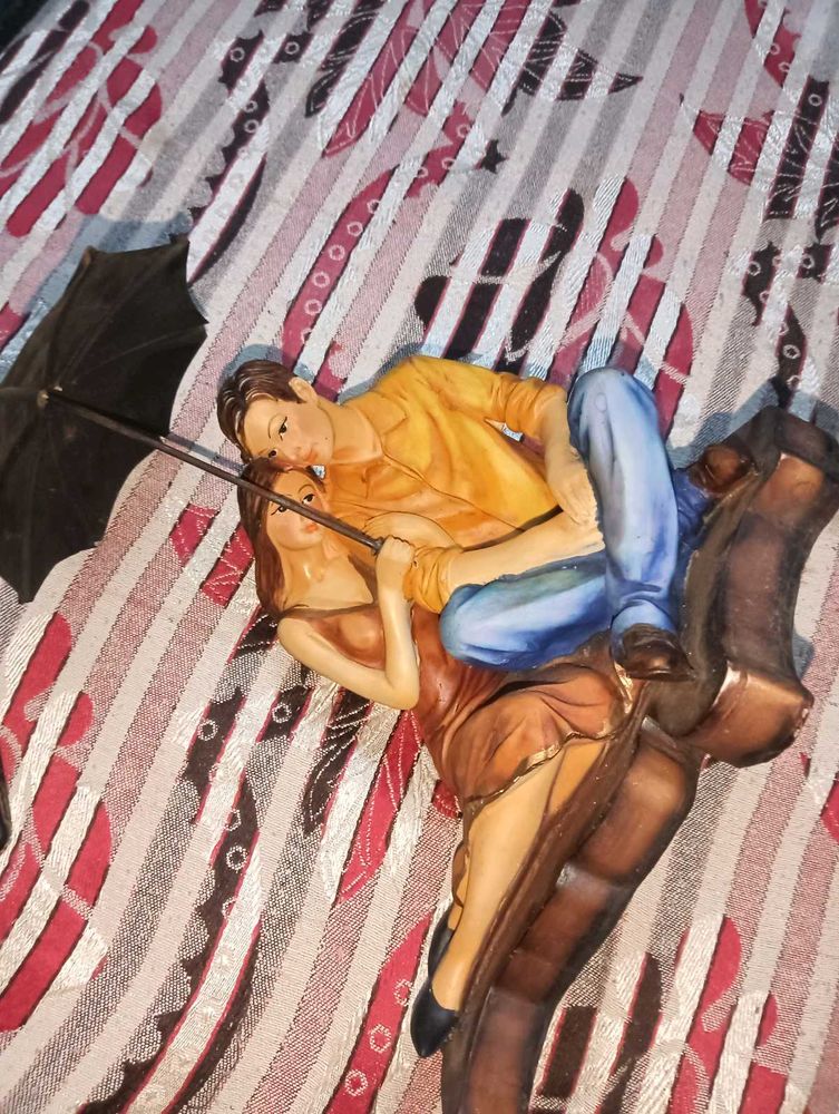 Vintage Couple Under Umbrella Figurine