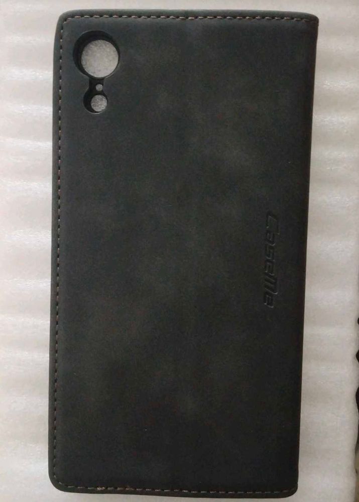Leather Flip Phone Case on Patterned Background
