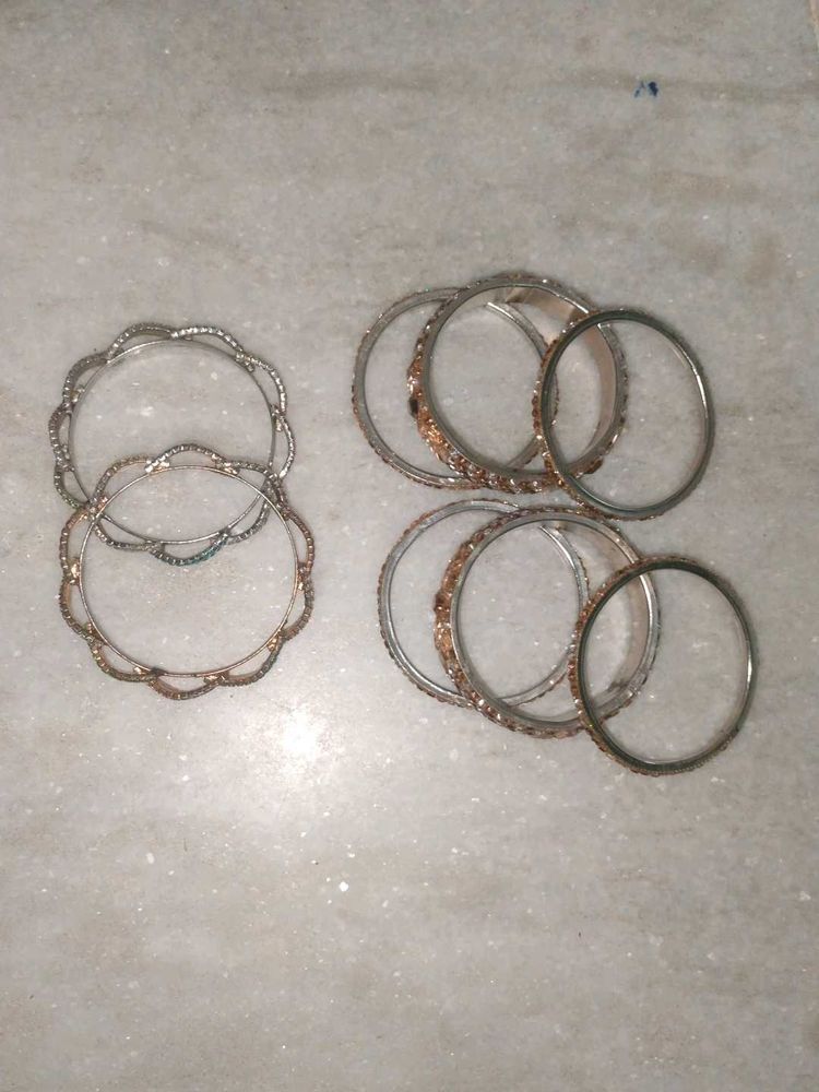 2 Sets Of Two Shiny Bangles