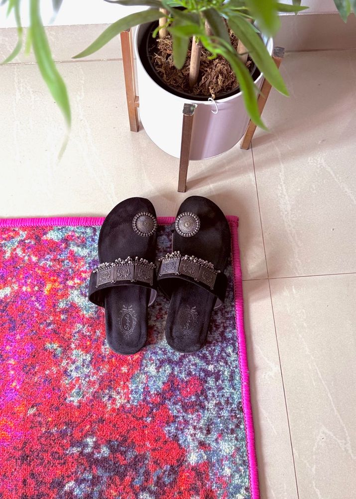 Elegant Black Ethnic Sandals with Ornate Silver Em