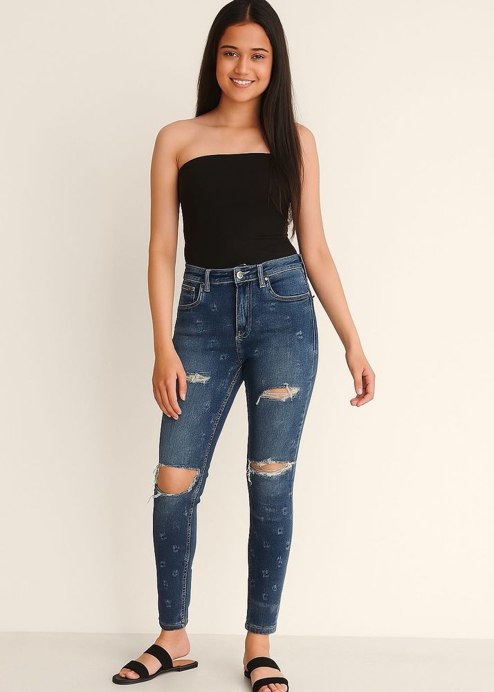 Edgy Elegance Distressed Floral Skinny Jeans”