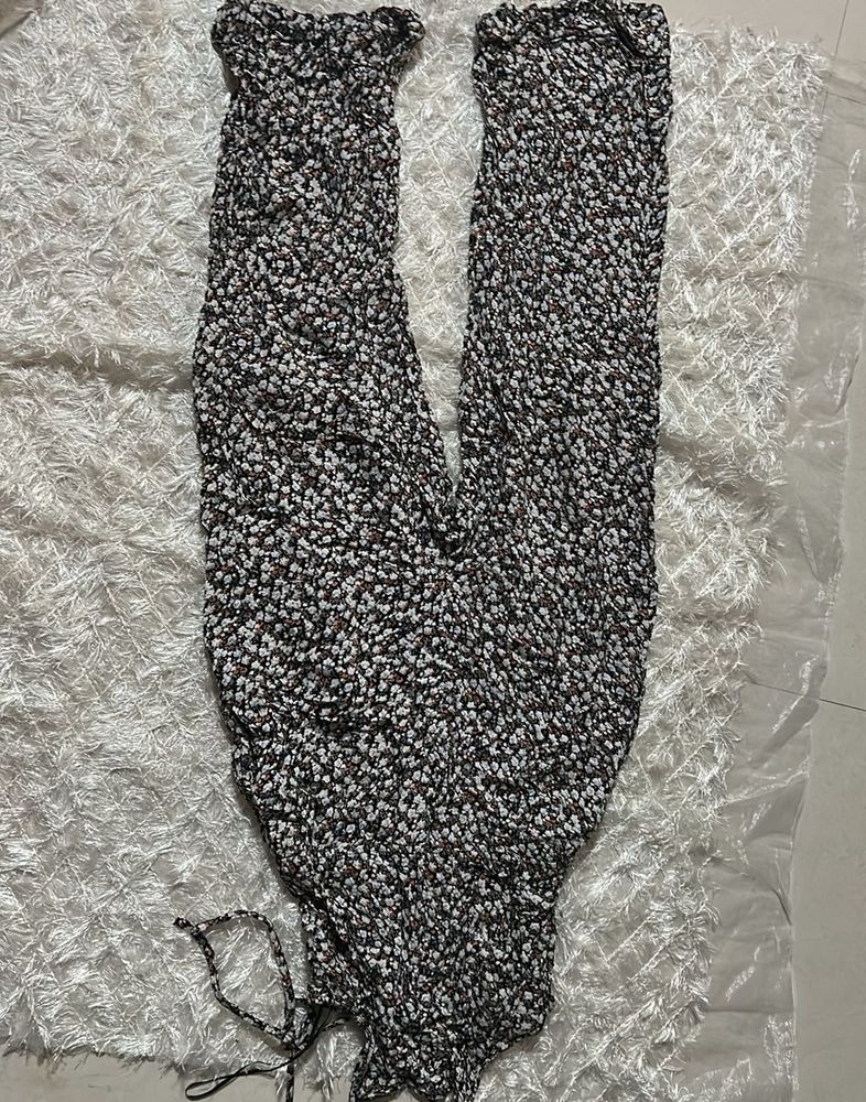 A Black Floral Jumpsuit