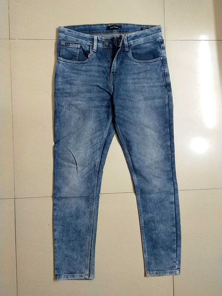 Highlander Brand Slim Tapered Jeans