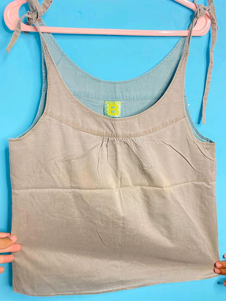 OLIVE SLIP TOP WITH STRIPS.