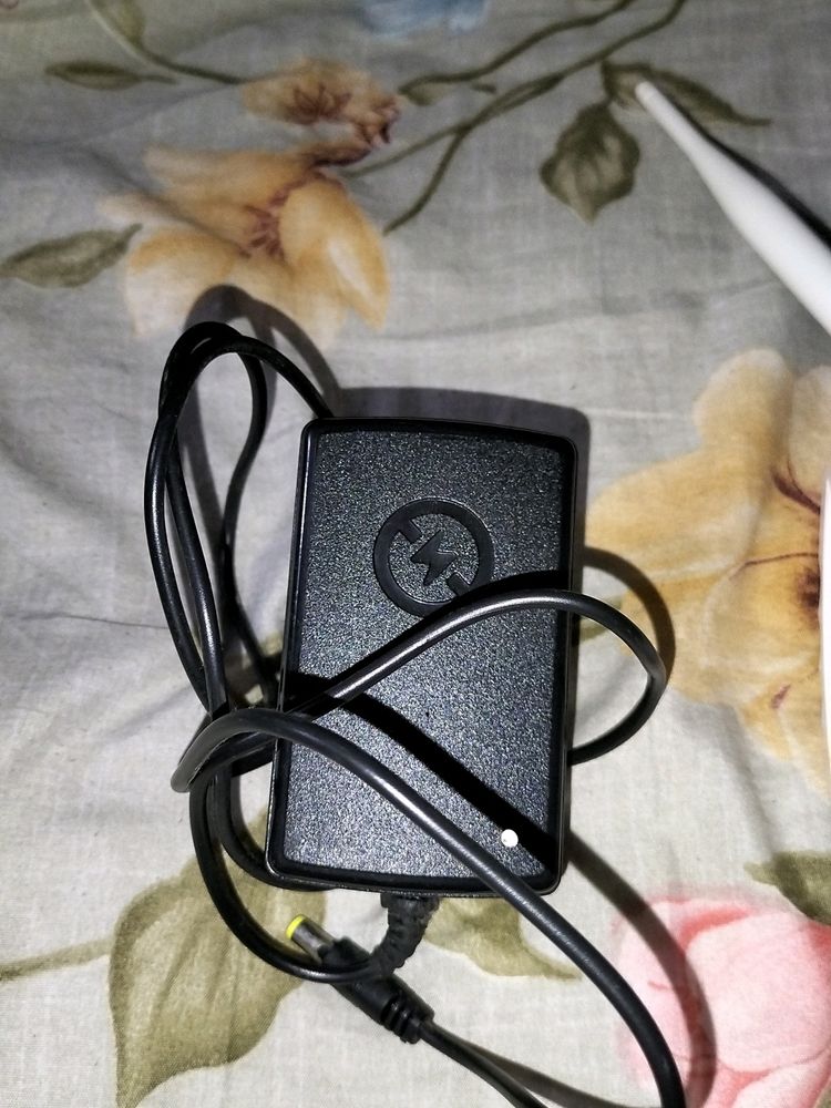 Airtel Broadband Postpaid Adaptor And Receiver.