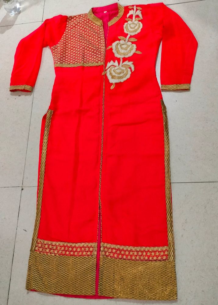 Pinkish Georgette Suit With Flower Design In Front