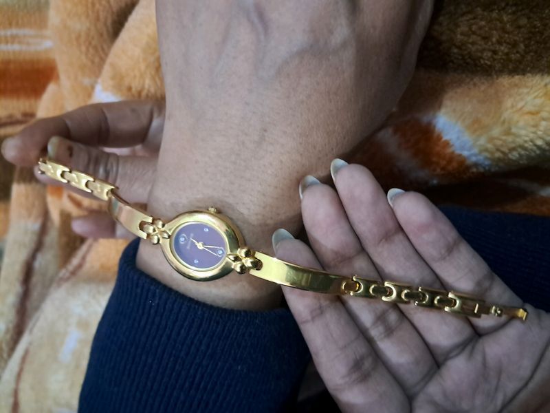 Sonata Gold Watch