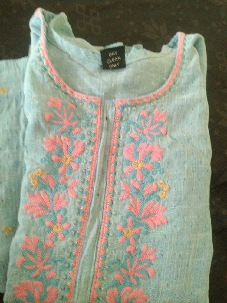 It&#39;s a Handworked Kurti.Bottle Green Colour.