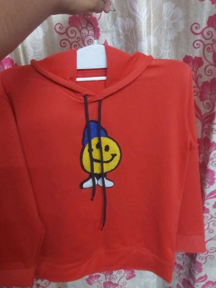 Red Hoodie With Smily Sticker
