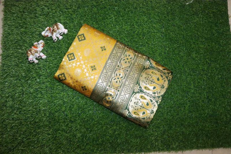 Yellow Silk Saree with Green Border