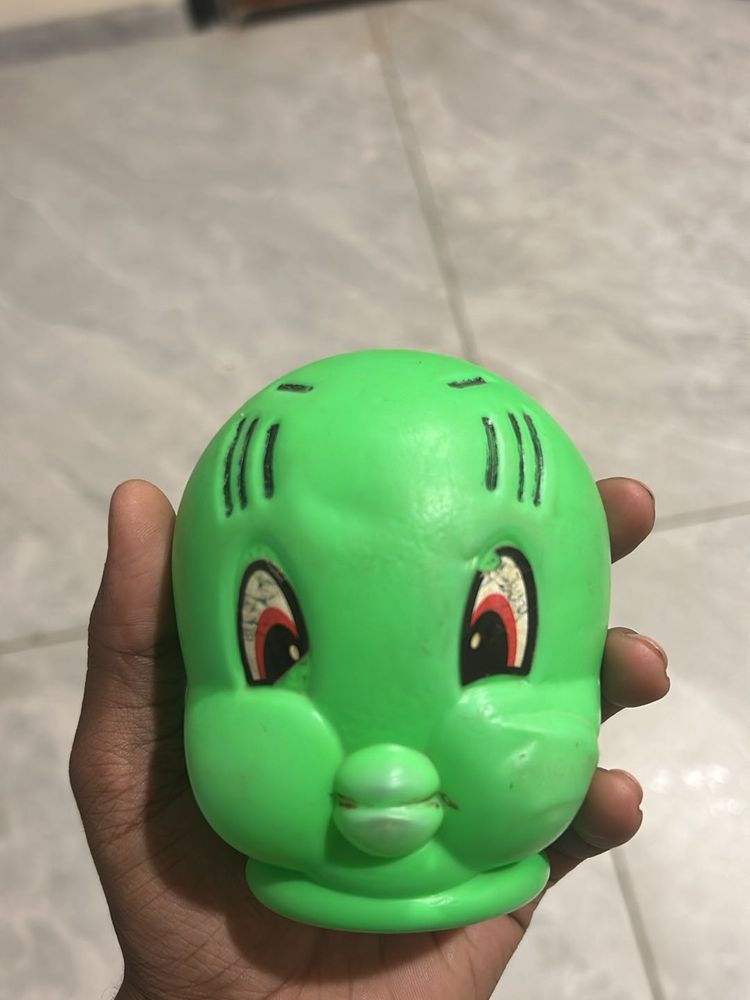 Green Squeeze Toy With Piggy Backing