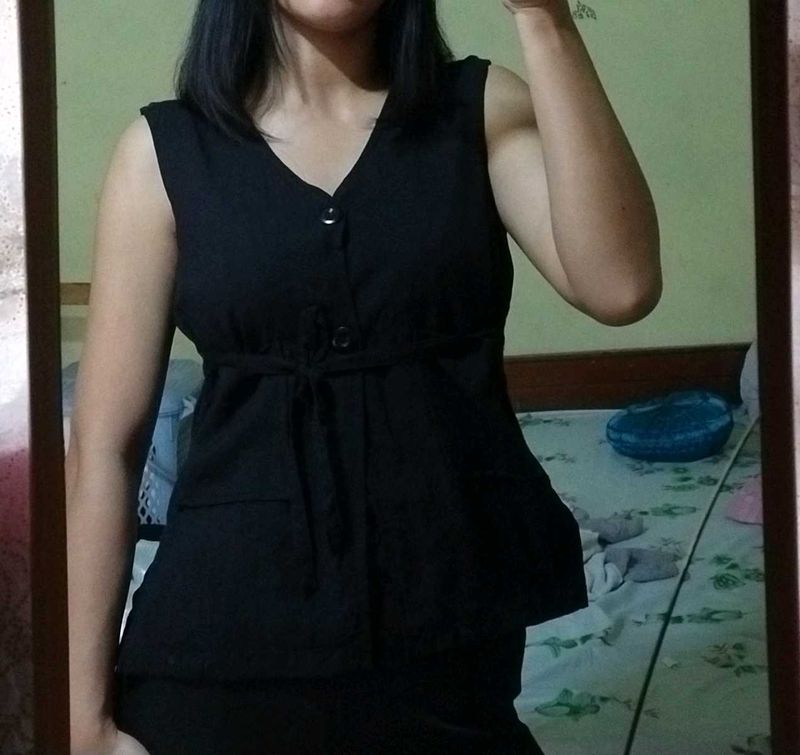 Black Vest Top.