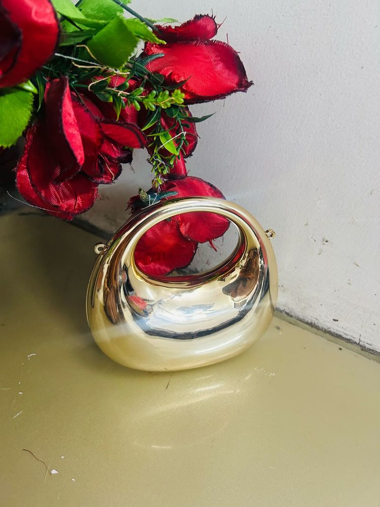 Gold Handbag with Unique Handle