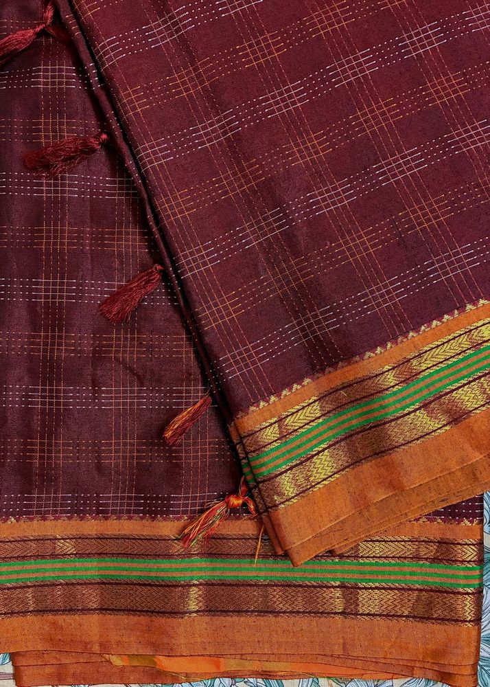 Like new maroon colour sari with Zari