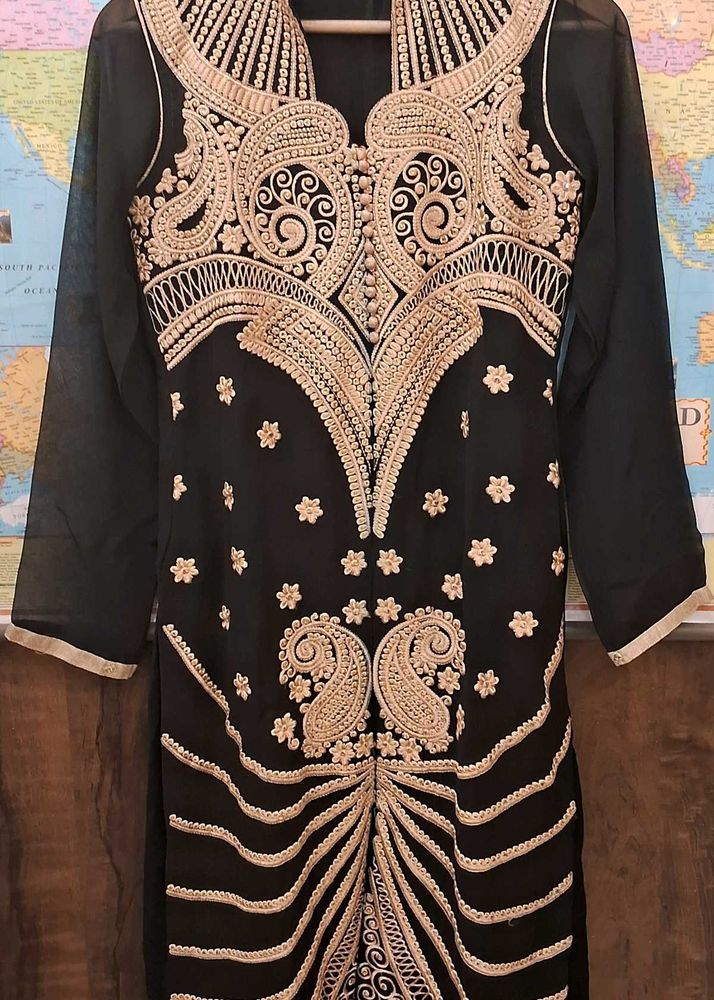 Party Wear Suit With Heavy Golden Emb