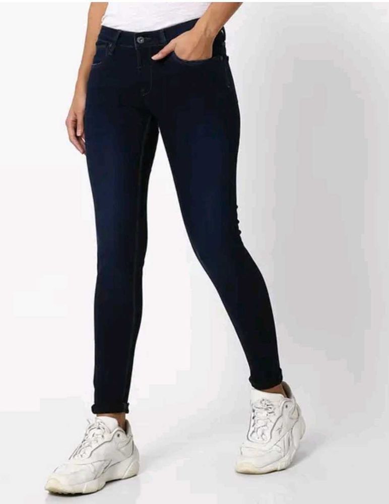 Mid Rise 5 Pocket Skinny Jeans