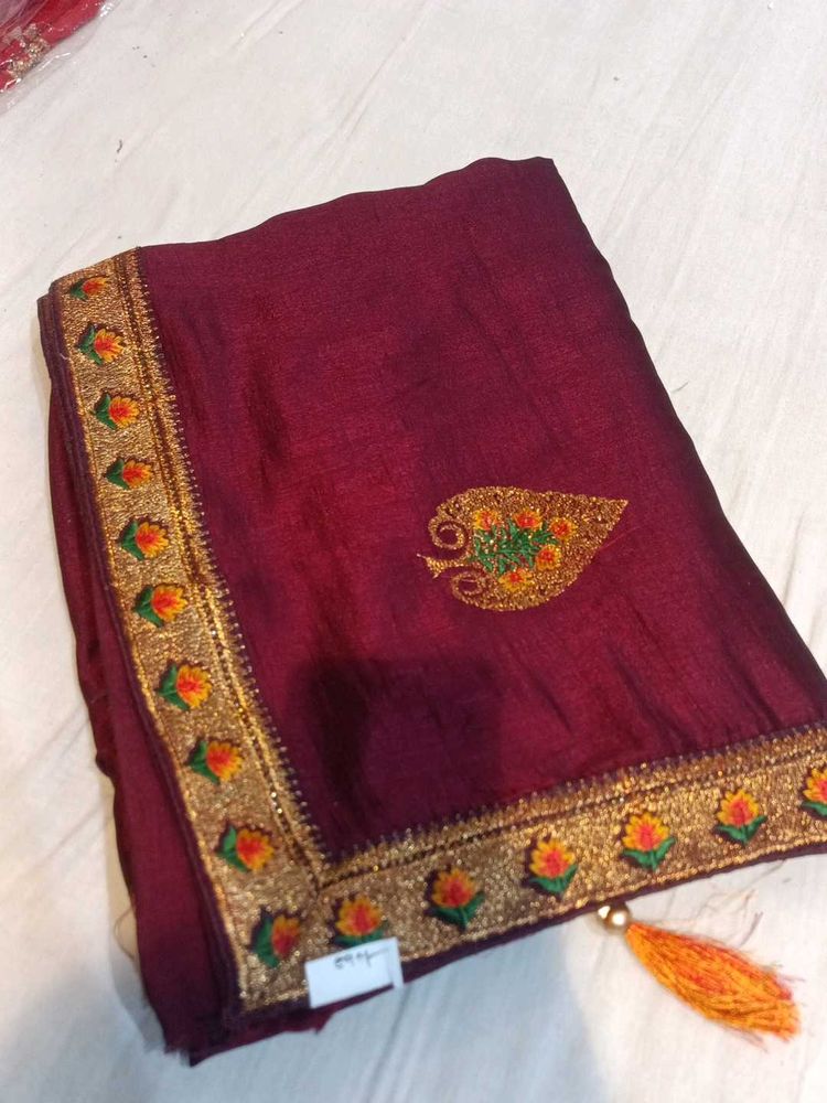 Elegant Maroon Saree with Gold Embroidery