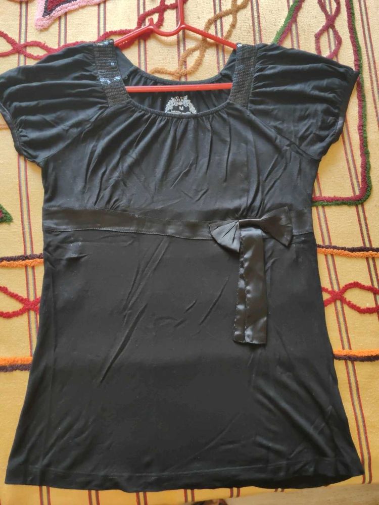 Chic Black Top with Bow Detail