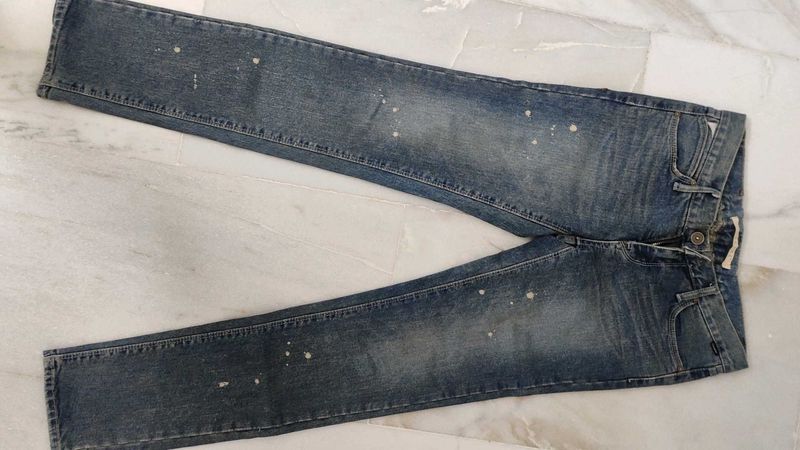 Distressed Denim Jeans