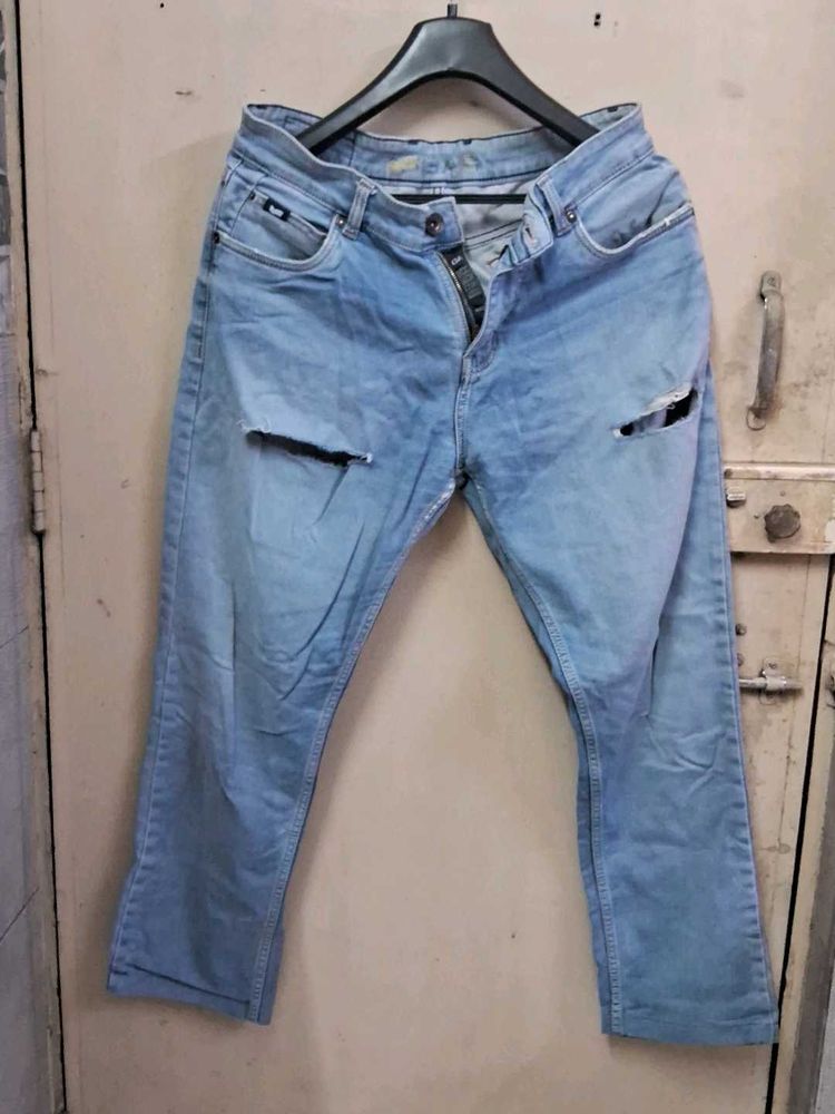 Ripped Blue Denim Jeans