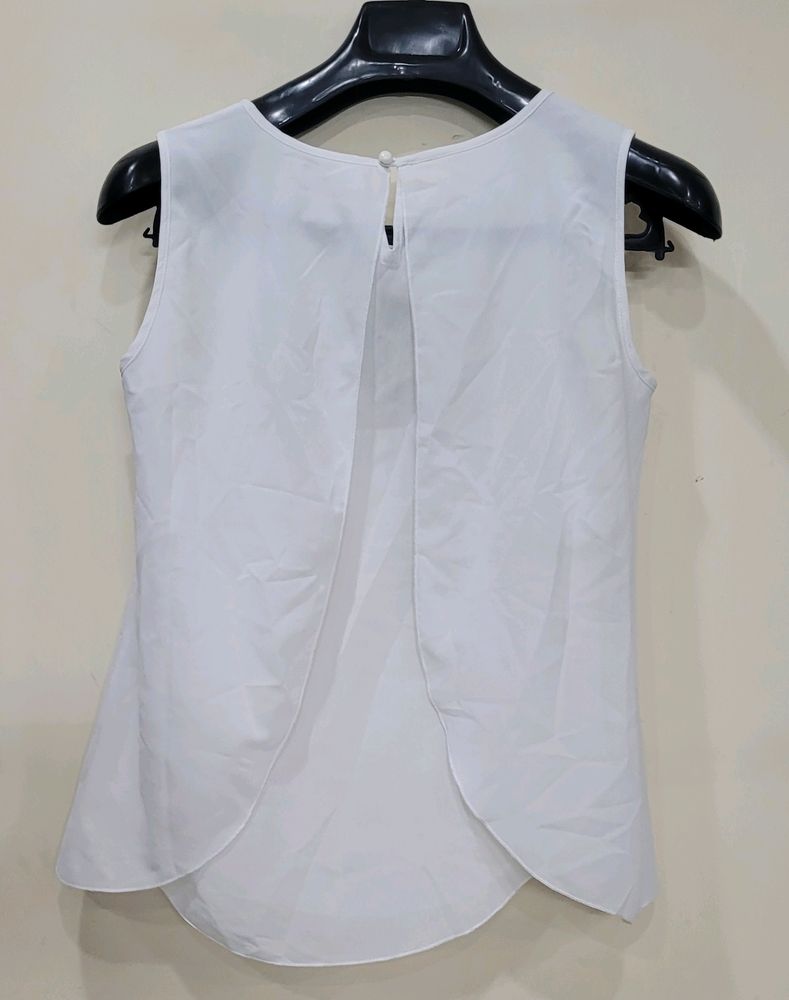 White Sleeveless Top