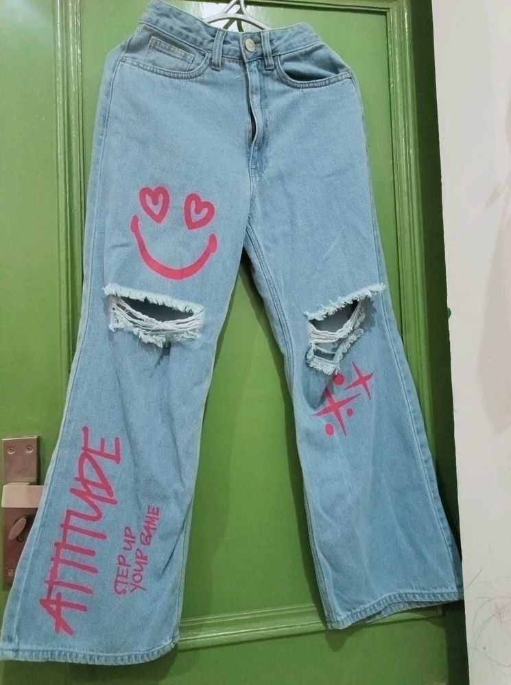 Ripped Jeans with Graffiti