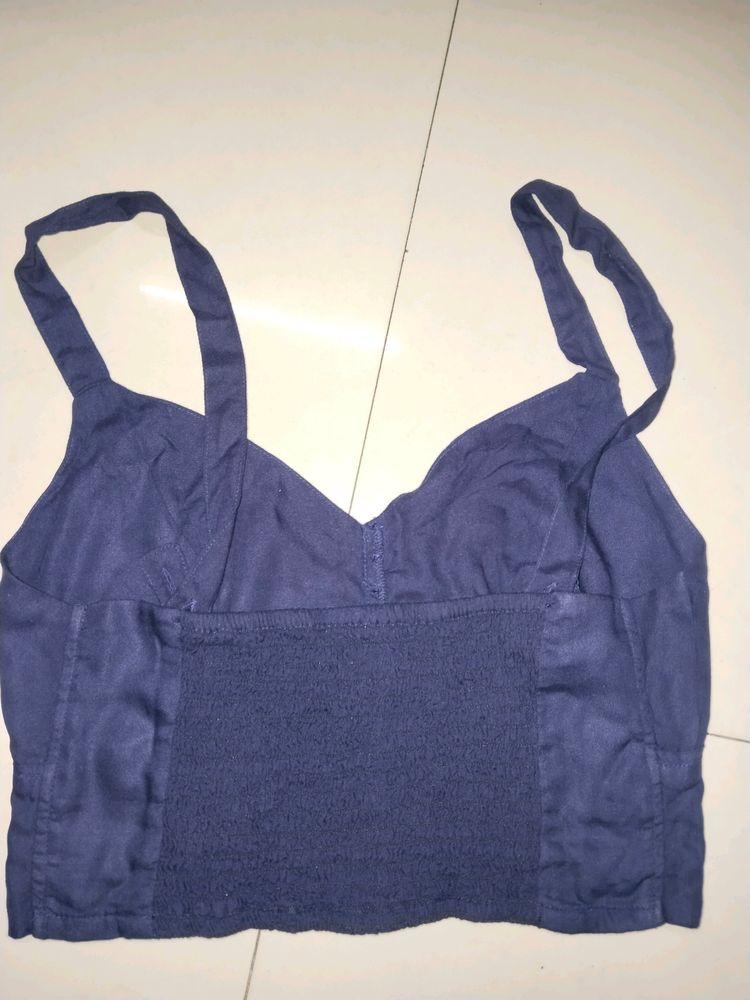 Smart, button-front camisole top.