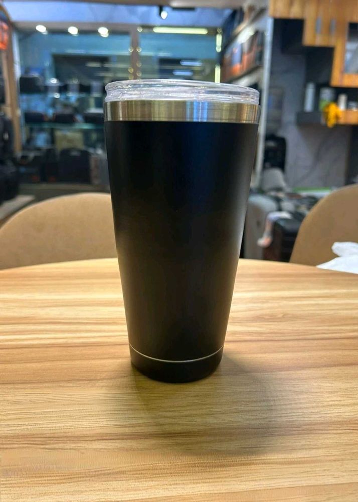 Black Tumbler and Lid With Thermal control.