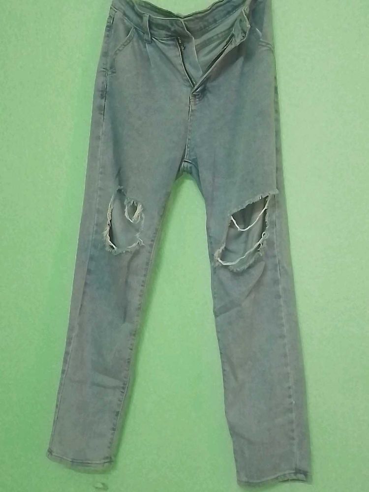 Ripped Knee Jeans