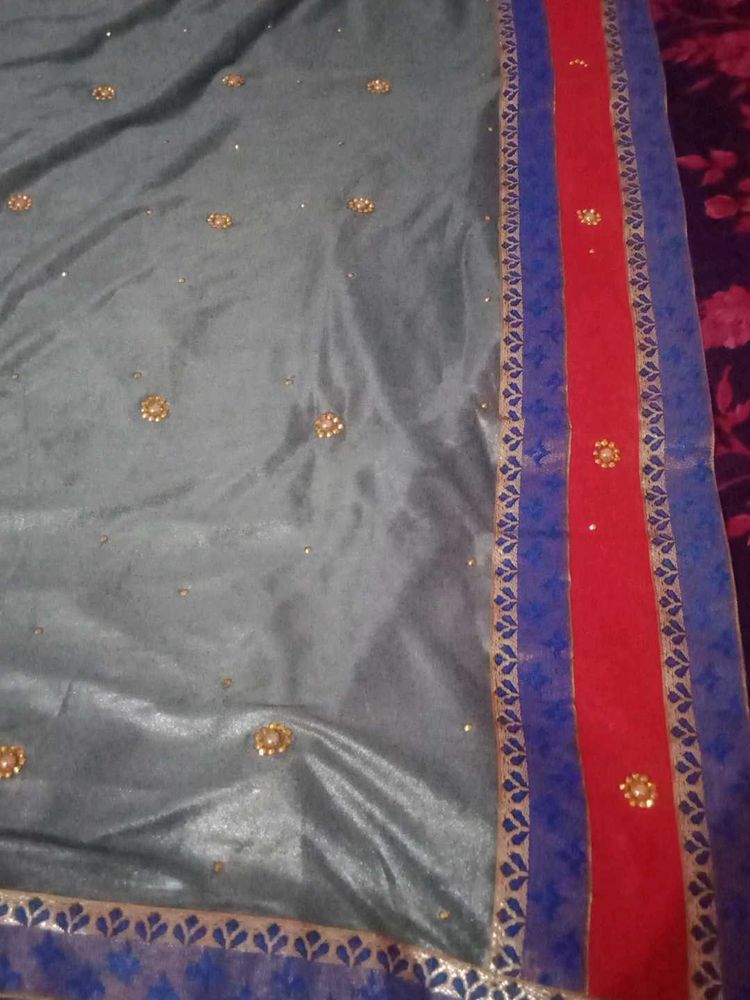 Elegant Grey Saree with Embellishments
