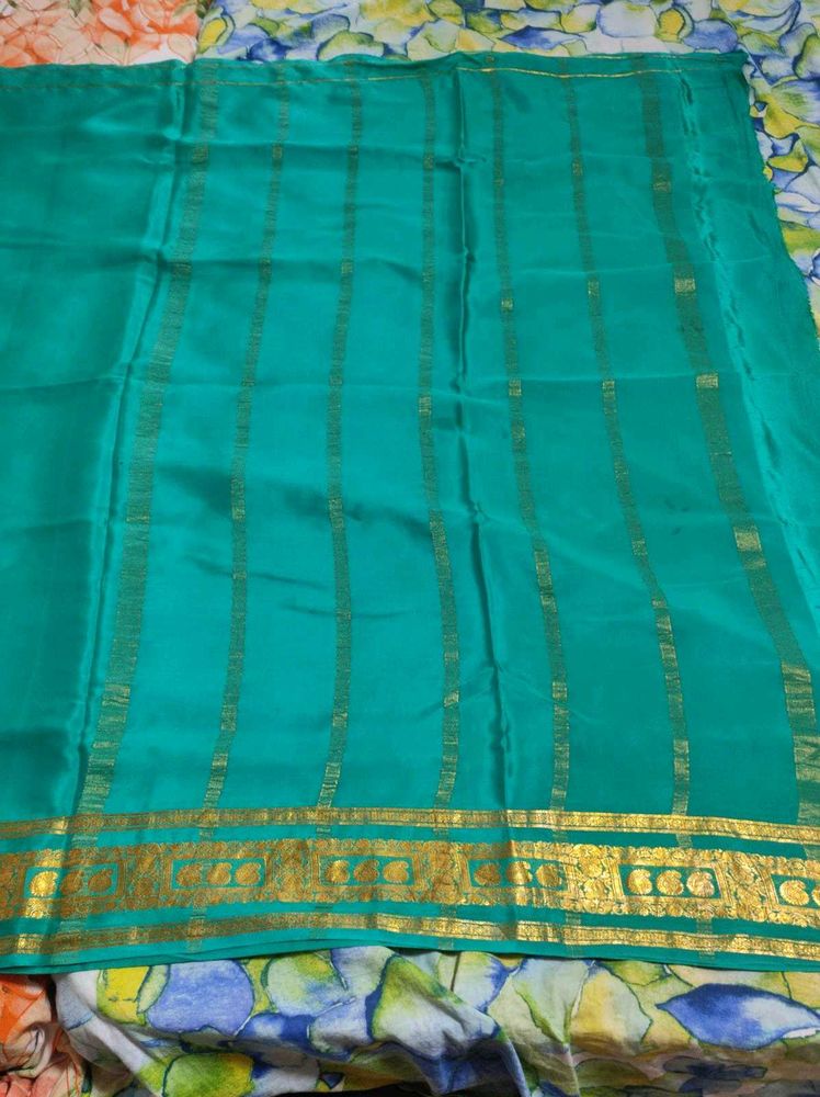 Teal Green Pure Crepe Silk Saree