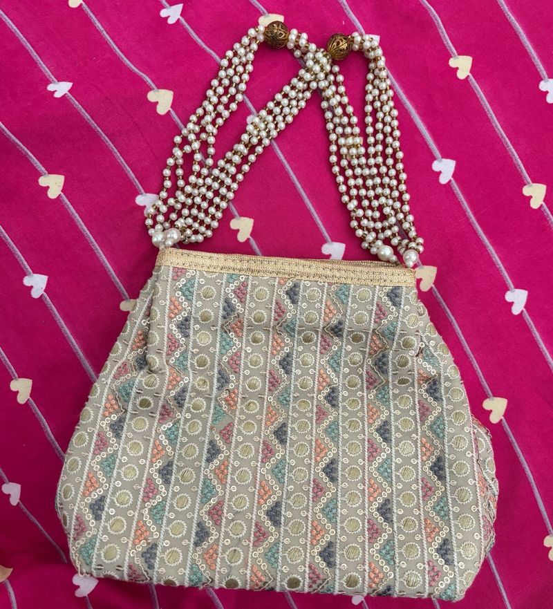 Graceful Ethnic Clutch With Embroidery