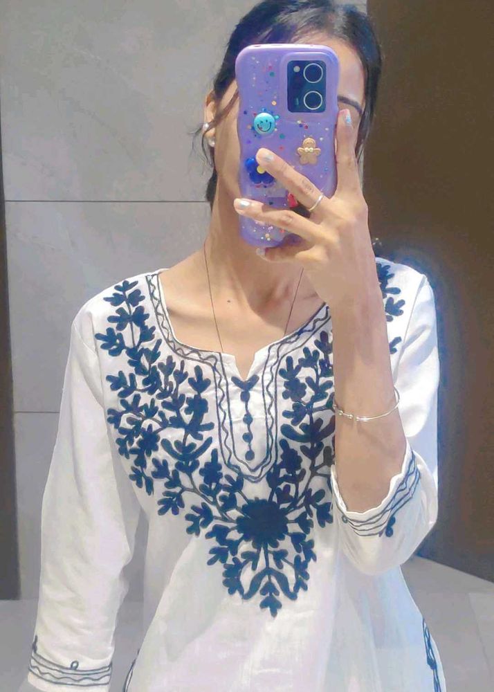 Elegant White Embroidered kurti