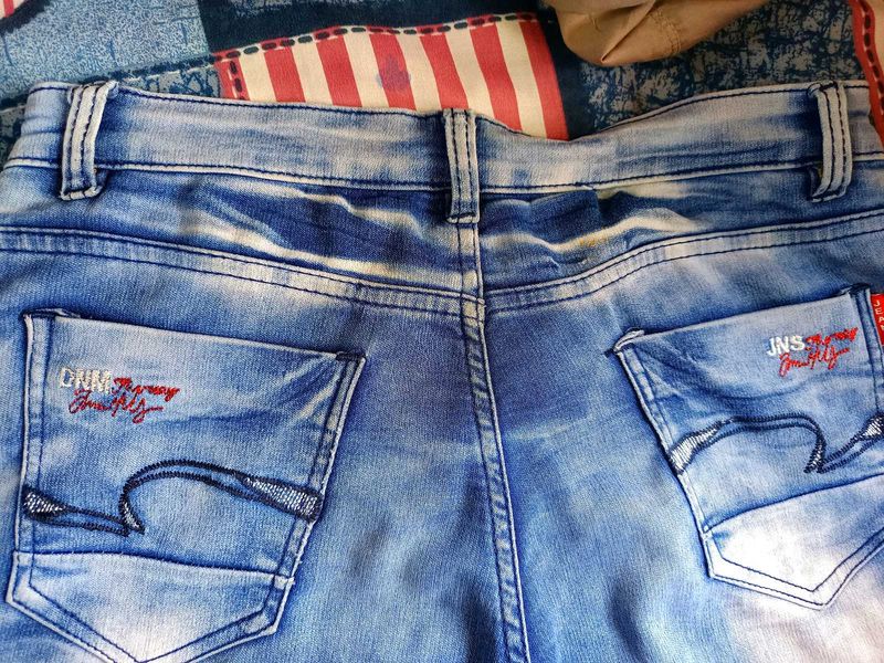Light Wash Jeans with Pocket Detail