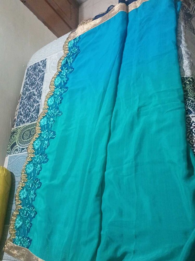 Elegant Teal Saree  Floral Details with stic