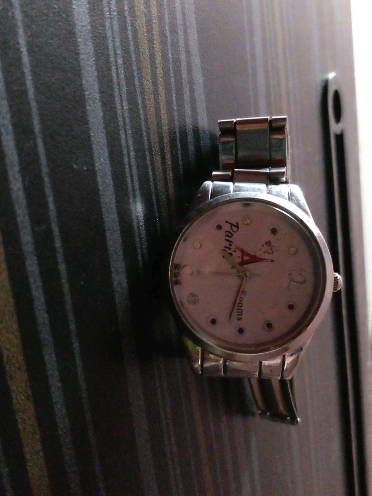 PRICE DROP Paris sooms girls watch. working but need little bit repair like need cell, chain rod.