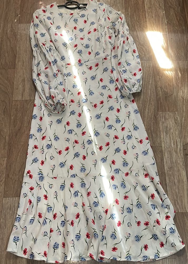Dress Length- Maxi  Sleeves- Long Puff Sleeve It A