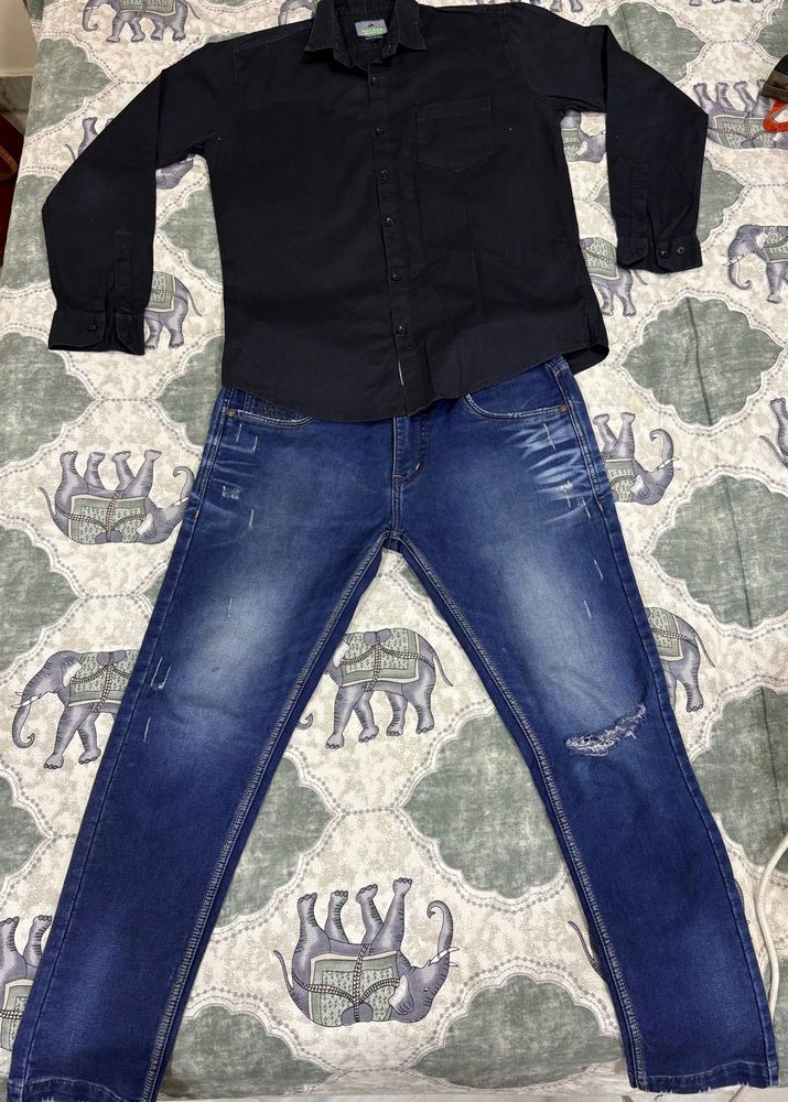 Combo of Black shirt and blue jeans