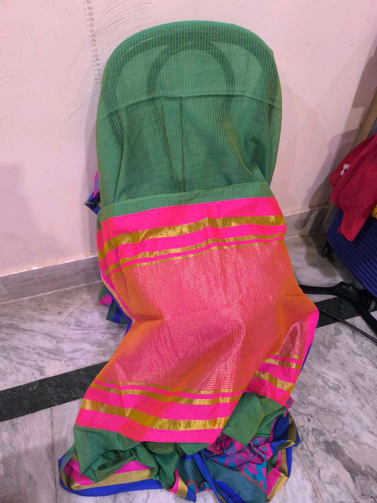 Green saree with multicolour details and glitter s