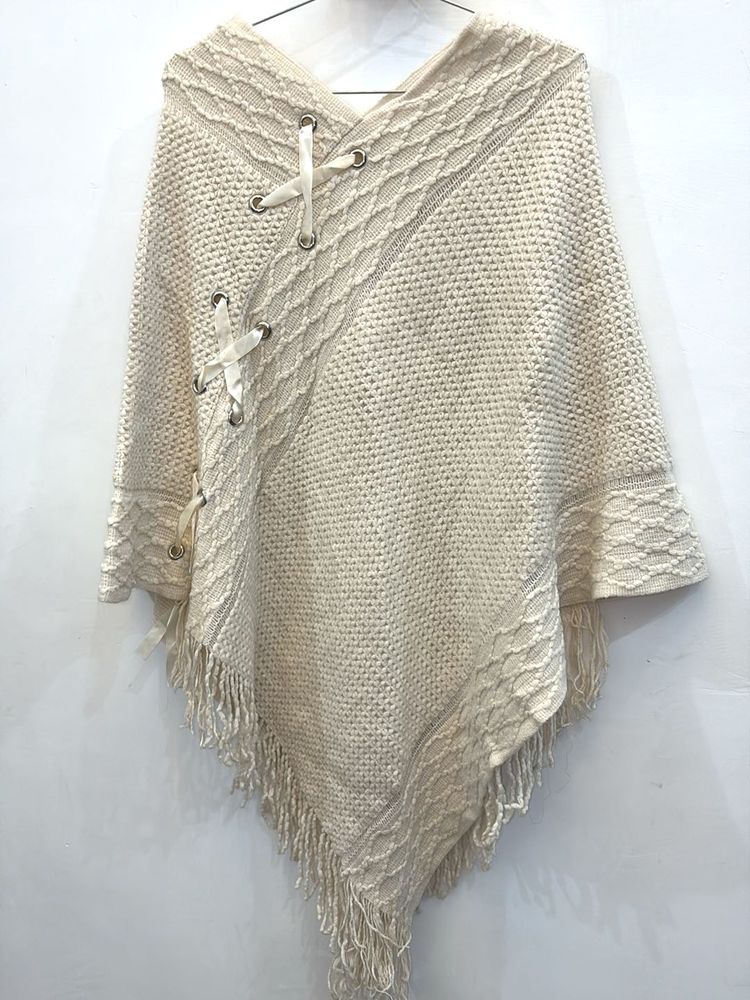 Stylish Crochet Poncho with Fringe