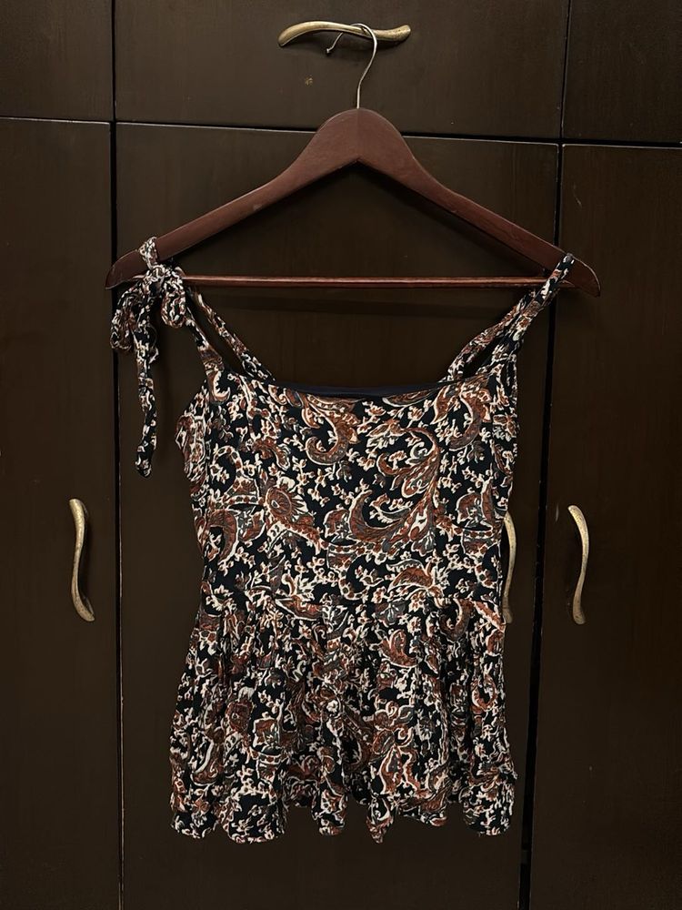 sleeveless short kurta