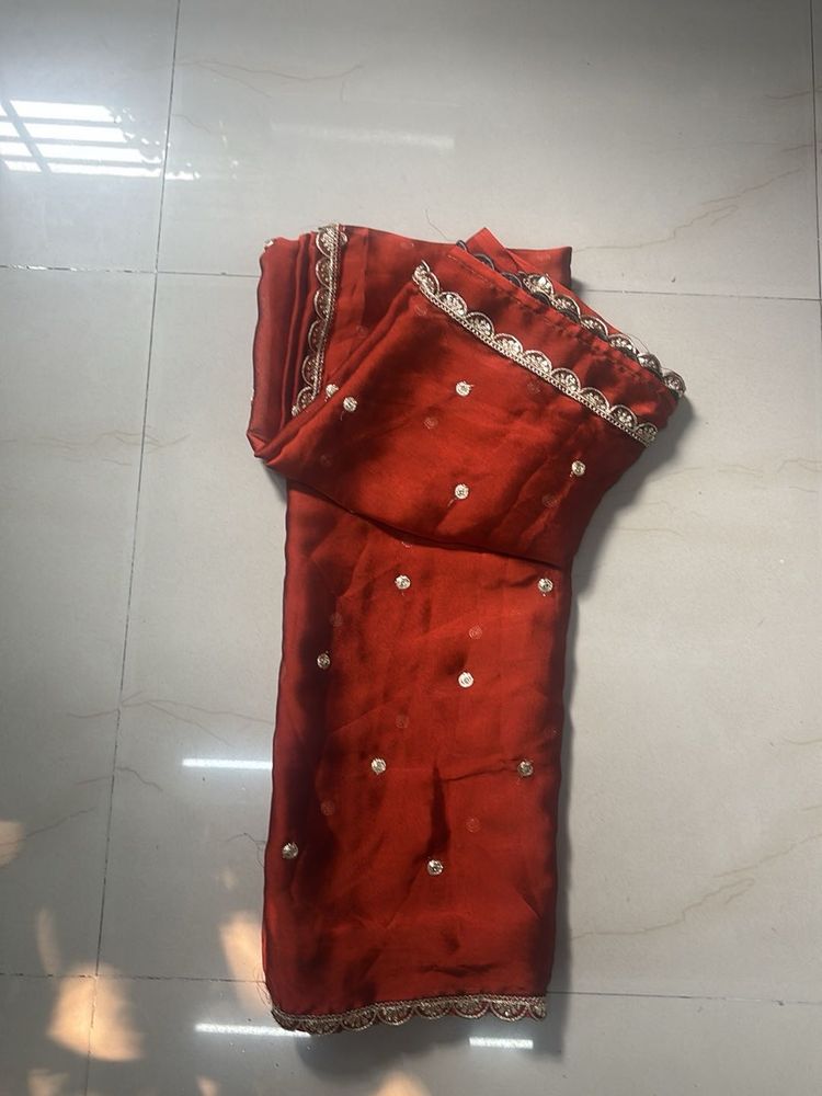Elegant Red Saree with golden blouse