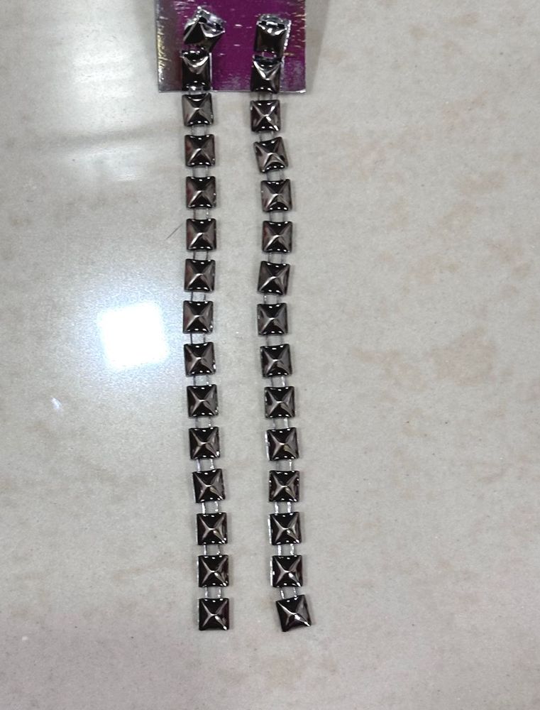 Dangle earrings with square studs