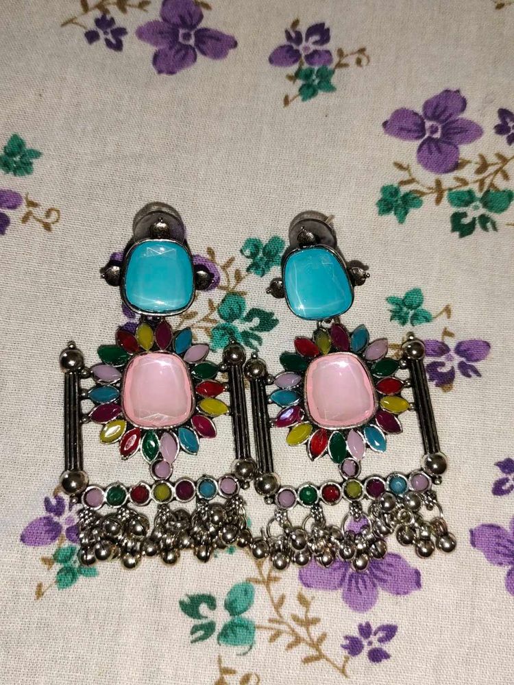 Beautiful colour full silver oxytocin earring😍😍