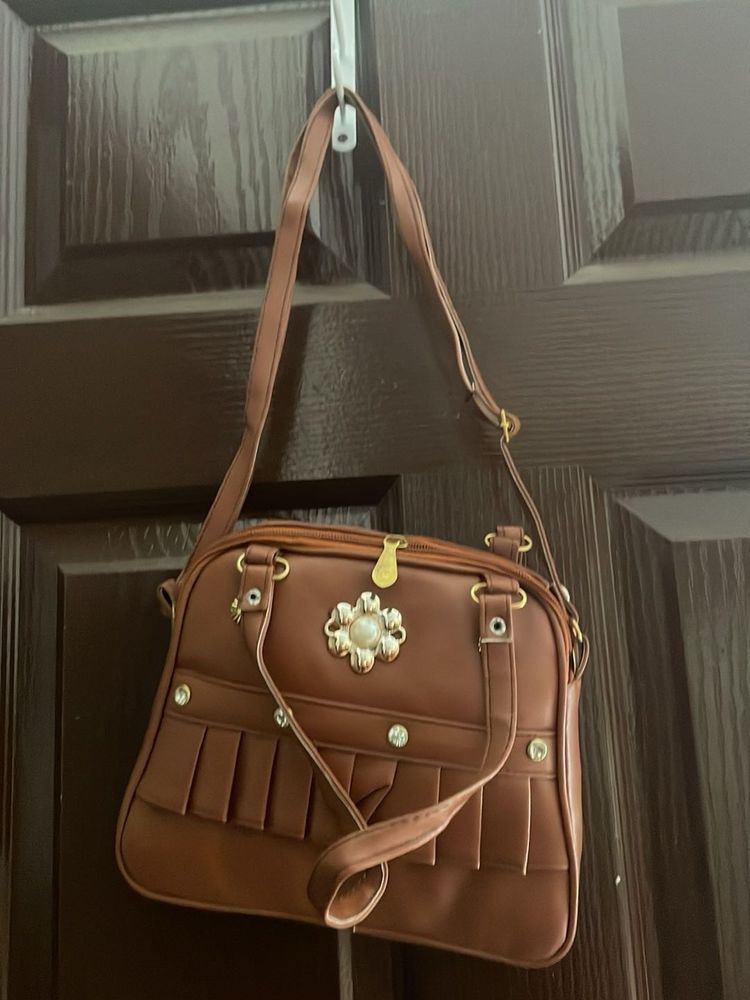 New Brown Handbag with Floral Detail